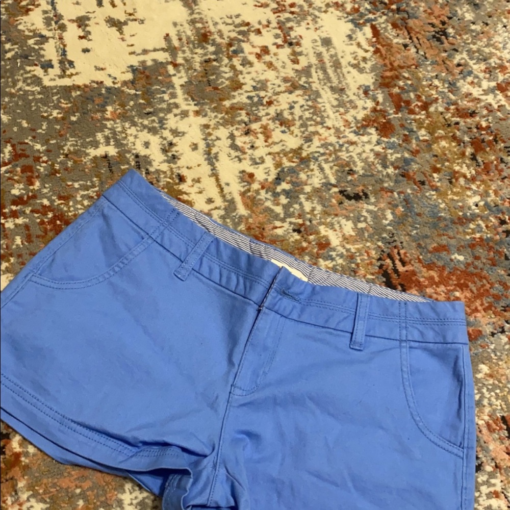 blue shorts.